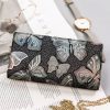 Peterson PTN 421431-ONBF szürke pillangó mintás női bőr pénztárca 10 x 19 x 2.5 cm