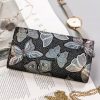 Peterson PTN 421431-ONBF szürke pillangó mintás női bőr pénztárca 10 x 19 x 2.5 cm